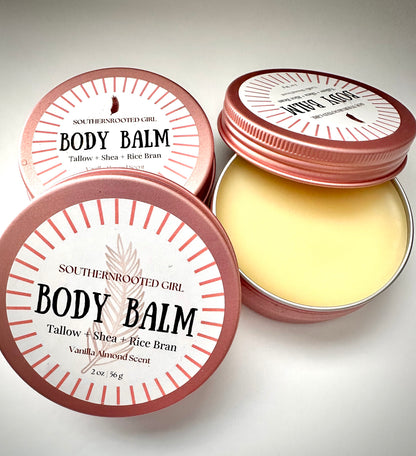 Body balm in a tin with 'Southern Rooted Girl' branding on a light background